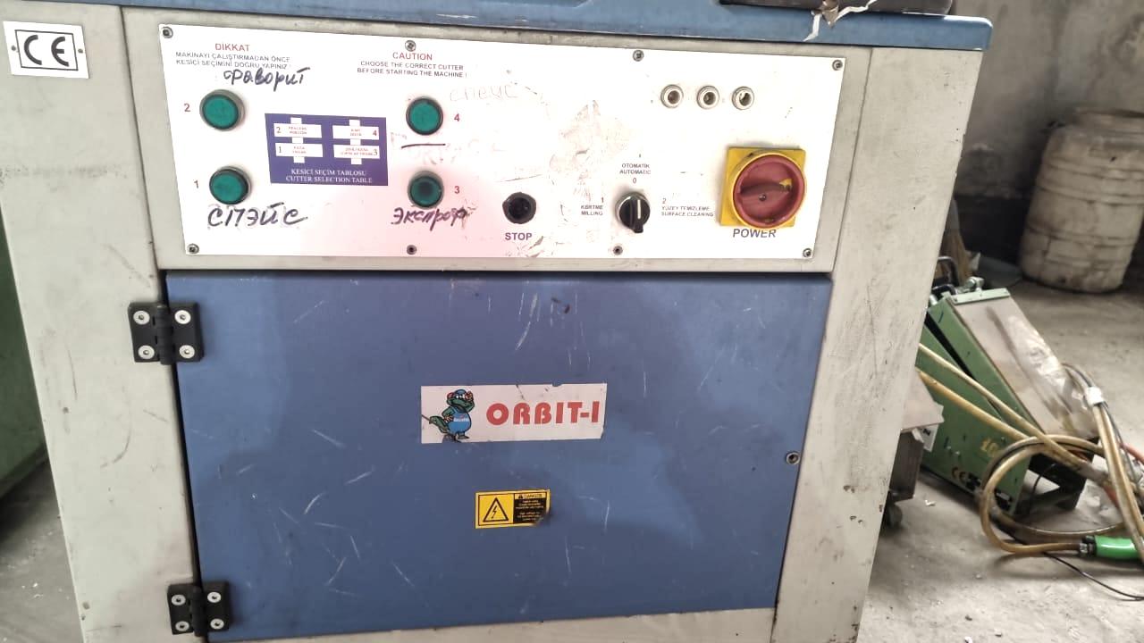OZCELIK ORBIT I Автоматический углозачистной станок для окон ПВХ на 4 фрезы (Б/У оборудование)