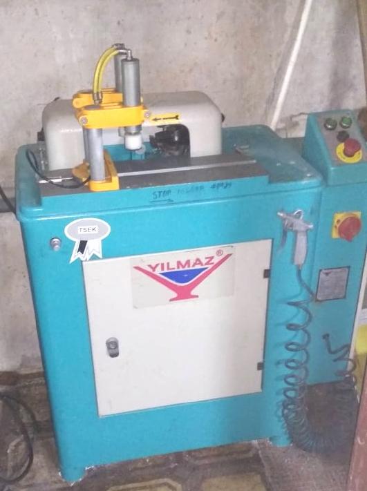 YILMAZ KM 213 Автоматический фрезерный станок для обработки торца импоста ПВХ и алюминиевых профилей (Б/У оборудование)