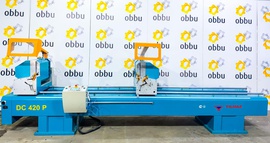 YILMAZ DC 420 P Автоматическая двухголовочная пила с фронтальной подачей пильных дисков для ПВХ и алюминиевого профиля