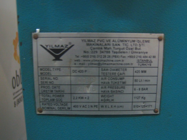 YILMAZ DC 420 P Автоматическая двухголовочная пила с фронтальной подачей пильных дисков для ПВХ и алюминиевого профиля (Б/У оборудование)